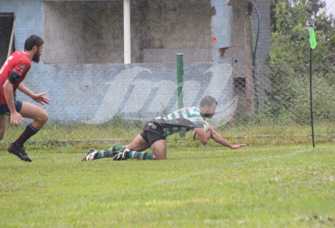 Teco anotando o terceiro try da partida/Foto: Kévin Sganzerla